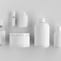 Close up of blank white make-up or medicine packaging objetcs. Advertisement concept. Mock up, 3D Rendering