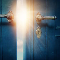 Open blue door and sunshine